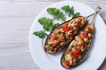Stuffed aubergine with meat, cheese and tomatoes