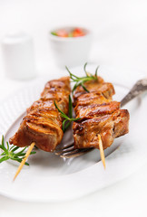 meat skewers, kebab with paprika vegetable salsa