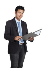 Asian businessman open a folder and smile