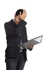 Asian businessman headache with a folder