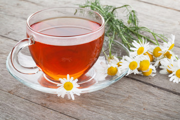 Herbal tea with chamomile flowers
