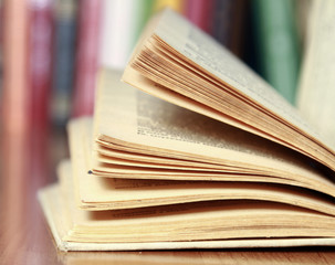 Book on the desk against books