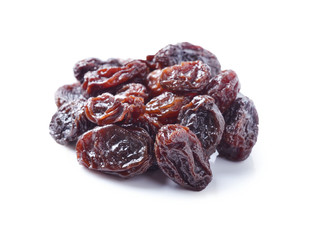 pile of raisins on white background