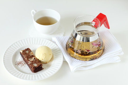 ice cream and brownie with teapot