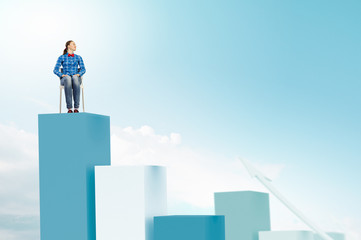 Woman sitting on bars