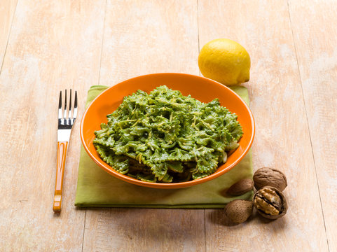 Pasta With Spinach Pesto Almond Nuts And Lemon Peel