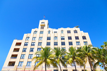 Art deco building and palms of Miami Beach, Florida.