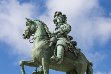 Fototapeta na wymiar Louis XIV Sculpture in Versailles
