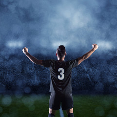 Fototapeta na wymiar Hispanic Soccer Player Celebrating winning the game