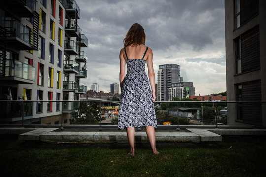 Young woman looking at city