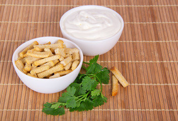Sour cream and bowl with toast