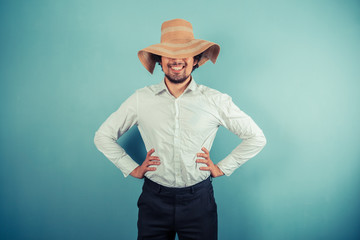 Young man with a beach hat