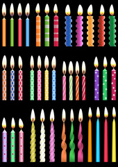 Colorful birthday candles on black background