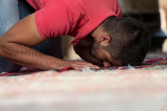 Young Muslim Guy Praying