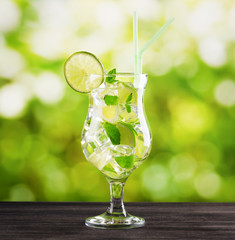 Mojito cocktail on nature background