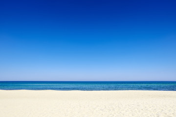 Summer blue sky sea coast sand background copyspace. - obrazy, fototapety, plakaty