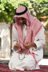 Muslim Man Praying At Mosque