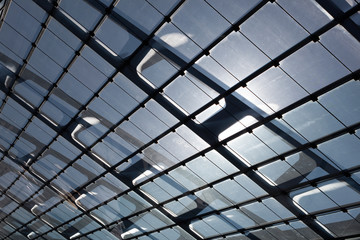 The glass roof of the station in sunlight