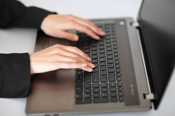 businesswoman using laptop