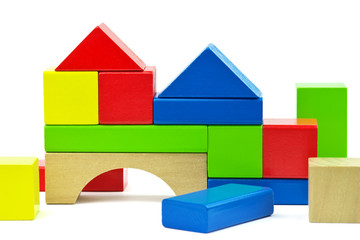 House made from toy wooden colorful building blocks