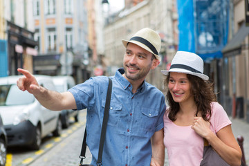 Young couple visiting city during holidays