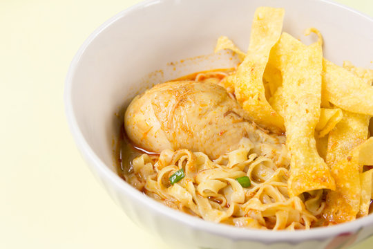 Egg Noodle with Chicken in Curry Soup (Thai food)