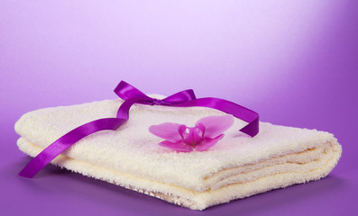 The fluffy, terry towel and orchid