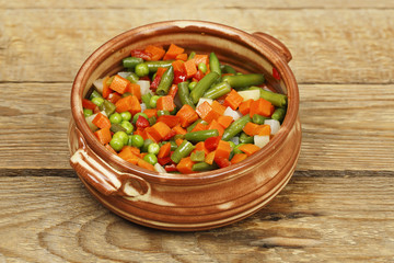 vegetables in clay bowl