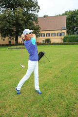 playing golf