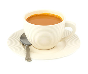 Cup of hot milk tea on white