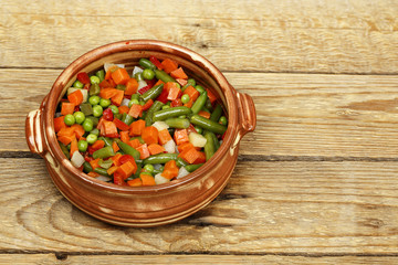 vegetables in clay bowl