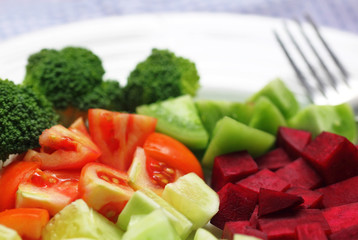 Fresh salad with silver fork