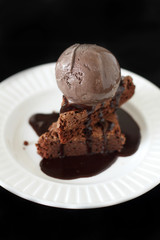 chocolate ice cream on slices of  brownie