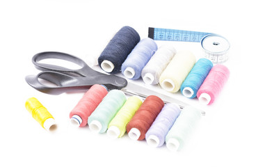 scissors thread and tape measure