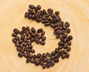 Coffee bean on wooden background