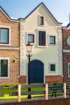 classic dutch houses on street at sunny day