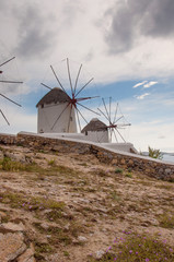 Fototapeta na wymiar Windmills in Mykonos city