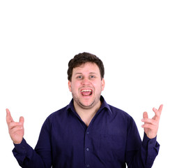 Portrait of angry young man looking straight forward and shoutin