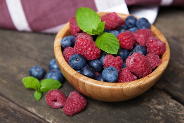 Fresh berries on a wooden table
