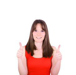 Portrait of happy woman with thumbs up against white background