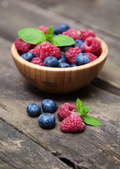 Fresh berries on a wooden table