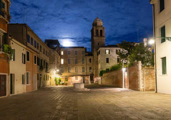 Night view of old square in Santa Croce in Venice, Italy