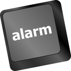alarm button on a black computer keyboard
