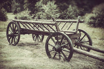 Fototapeta na wymiar old wooden cart, vintage stylized photo