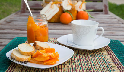 Tangerine marmalade and a cup of warm milk