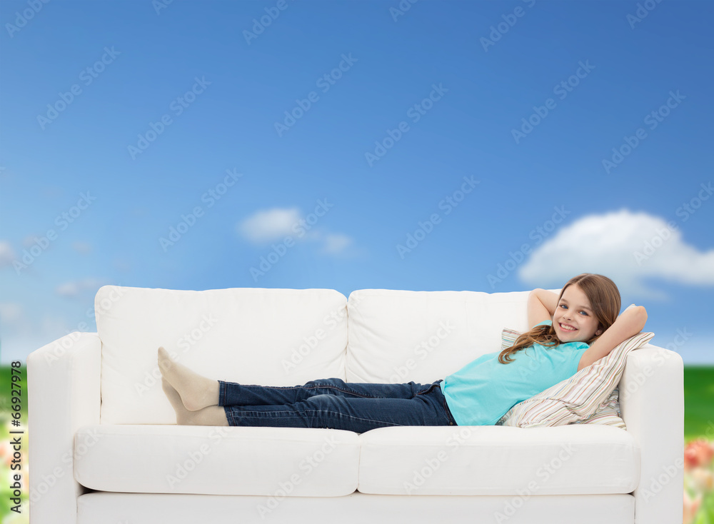 Sticker smiling little girl lying on sofa