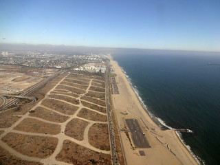 Fototapeta premium View of Beach, power plant, and surrounding area Leaving Los Ang