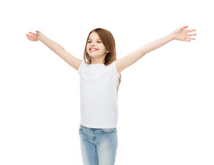 smiling teenage girl with raised hands