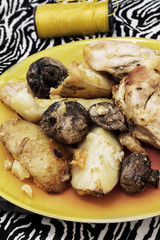 potatoes with meat fried with mushrooms