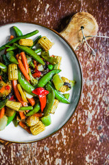 Baked vegetables on rustic background